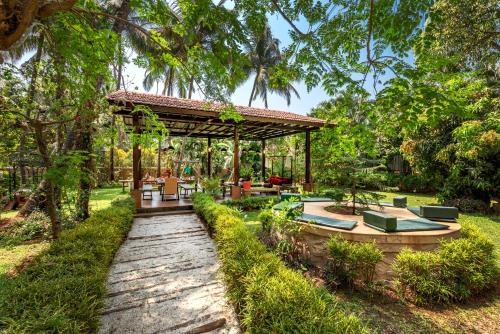 Saffronstays Casa Del Palms, Alibaug - luxury pool villa with chic interiors, alfresco dining and island bar