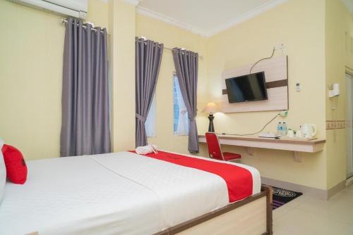 reddoorz syariah near lapangan dwiwarna barabai in Mabuun