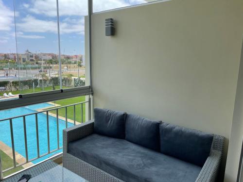 Bel appartement pied sur mer vue imprenable sur piscine et jardins in Sidi Rahal