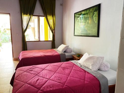 Bali Cottage Sambirenteng - Tap to explore photos