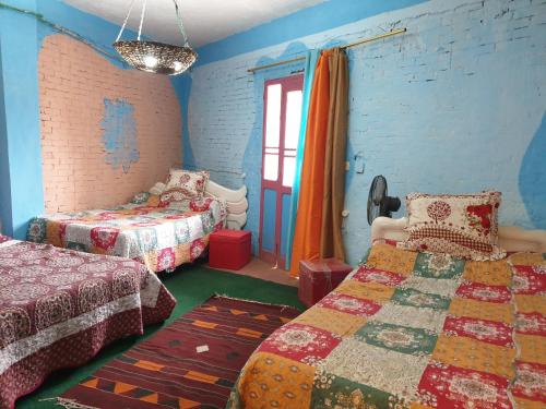 Rural Guest House فندق البيت الريفي Room Type - Triple Room with Balcony