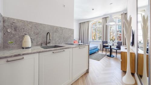 Grey Apartments - Waterlane Vintage in Mlyniska