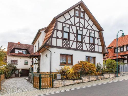 Holiday home in Thuringia with private terrace, use of a garden and pool