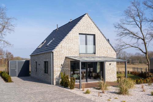 Ferienhaus Seewind am Harkebrügger See mit Sauna und Kamin