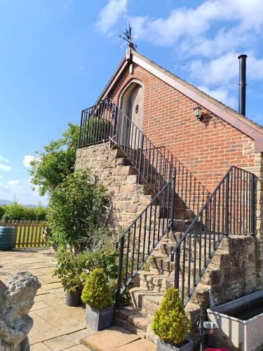 B&B Hereford - Lyde Cross Coach House - Bed and Breakfast Hereford
