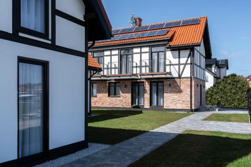 W Starym Porcie - pokój z widokiem na Zalew Wiślany balkonem i antresolą