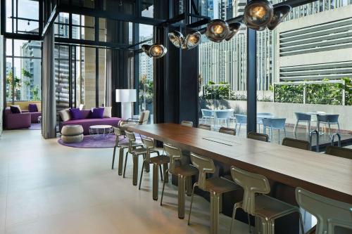 Shared lounge/TV area, YOTEL Singapore Orchard Road near Orchard Road