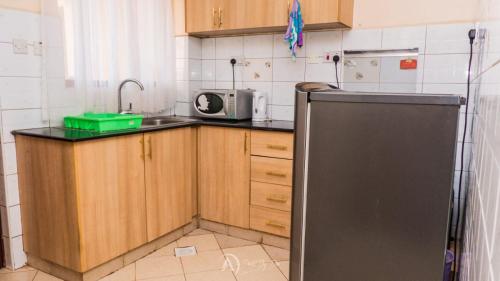 keuken, Lux Suites Makao Rossyln Apartments in Ruaka