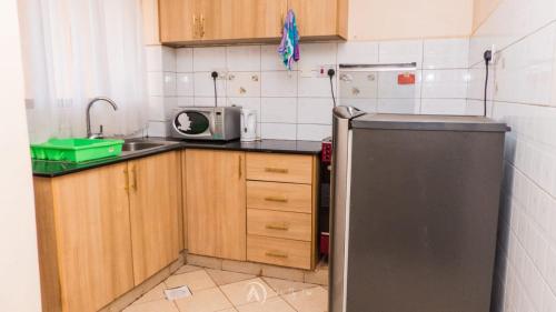 keuken, Lux Suites Makao Rossyln Apartments in Ruaka