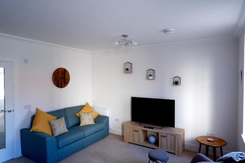 Спільний лаунж/ТБ зона, No 7 Quiet, two bedroom Ground Floor Flat in Tornagrain Great for early Airport departures or late f in Ардерсьєр