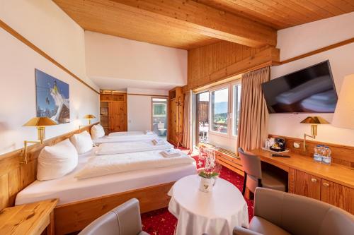 Guestroom, T3 Alpenhotel Flims in Flims