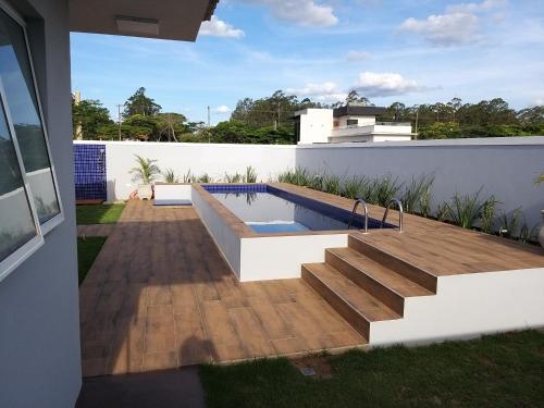 Swimming pool, Casa Piscina climatizada Santa Barbara Resort #CasaDeCampo131 in Aguas de Santa Barbara (Sao Paulo)