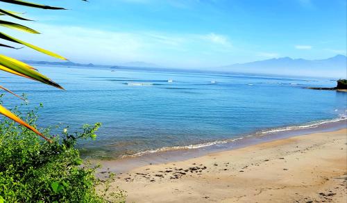 Beach, Ombak Resort at Ekas , a luxury surf and kite surf destination in Tanjung Ringgit
