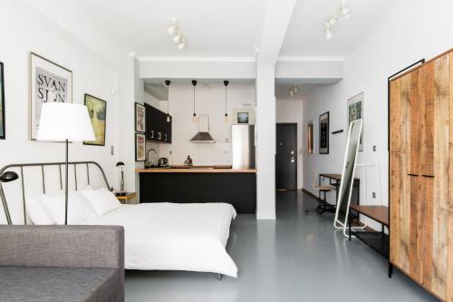 Explore a New Arts District from a Hip Studio Flat, Афины