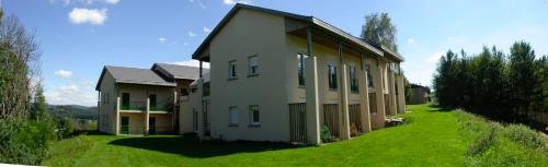 Hotelli välisilme, Village d+ Les roches de Scoeux in Chamberet