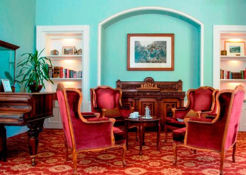 ห้องส่วนกลางสำหรับนั่งเล่น/ดูทีวี, โรงแรมโคลเฮ้าส์ (Coul House Hotel) in สเตร็ปเฟฟเฟอร์