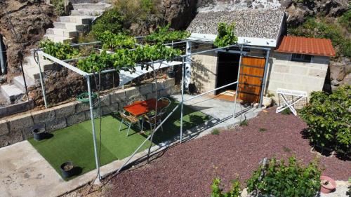 Casa Cueva Volcanica con Wifi, BBQ, jardin y magnifica vista a Atlantico gîte à louer Lomo de Mena