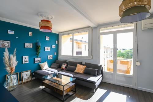 Appartement 3 chambres, climatisation, parking, proche centre ville et plage
