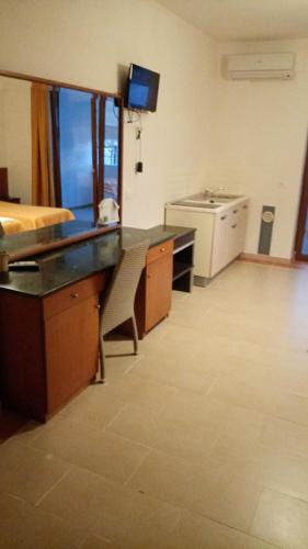 Kitchen, Appartamenti per Vacanza Manfredi Vieste, vista mare con parcheggio in Sant'Andrea