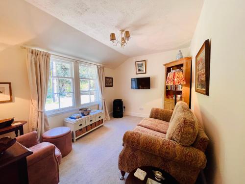Спільний лаунж/ТБ зона, Carnell Country Estate & Holiday Cottages in Ayrshire in Hurlford