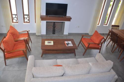 Delt lounge/TV-område, ARAUCARIA RESIDENCE in Gisenyi