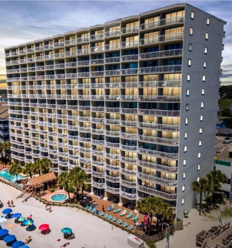 a large building with a lot of windows on top of it, 1009 Waters Edge Resort condo in Myrtle Beach (SC)
