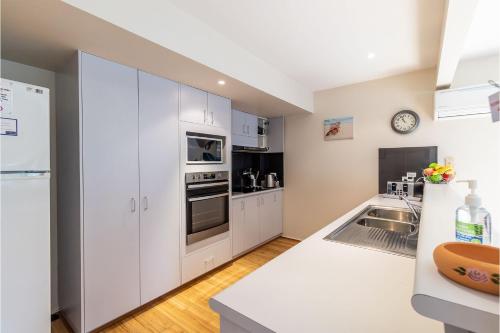 Sea Whispers 1 Just a short stroll to the beach