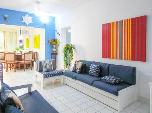 ห้องส่วนกลางสำหรับนั่งเล่น/ดูทีวี, Apartamento a 70 metros da Praia de Pitangueiras SP in มอร์โร โด มาลูฟ