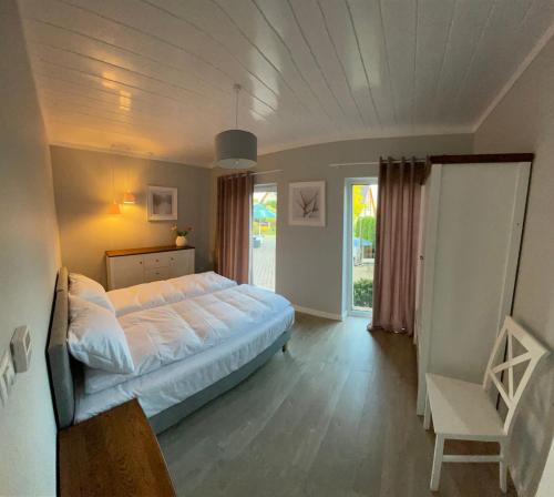 Dom Ogrodem Otulony in Olecko