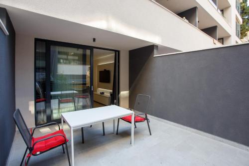 Apartments Maria 1 Maria 2 with parking space in the garage 2