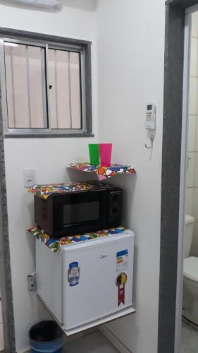 مطبخ, Sua Kitnet na Praia 12 Atencao PEQUENA So pra dormir Ambiente Familiar Ar Cond TV Microondas Frigoba in Centro de Vila Velha