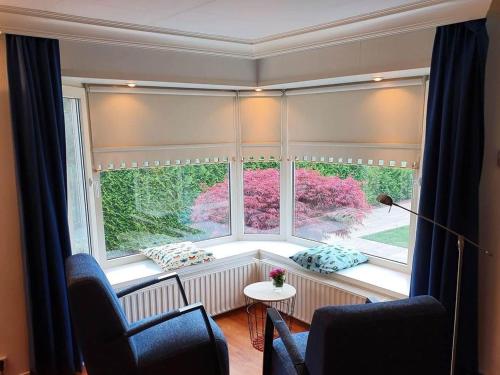Spacious chalet with garden in Garderen in Garderen
