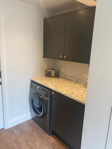 Stylish one bedroom Cotswold Coach House Tetbury in Tetbury