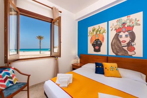 Bed, I Tre Golfi Beach Apartments in San Vito Lo Capo