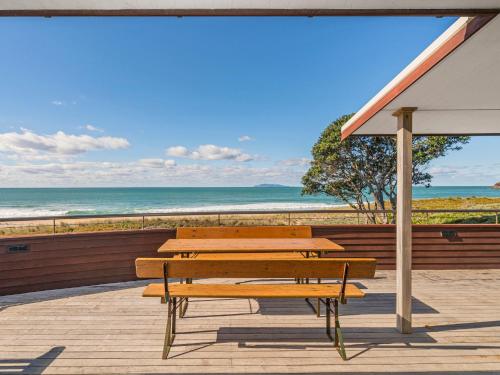 Absolute Beachfront Paradise - Whiritoa Beach Home photo 1