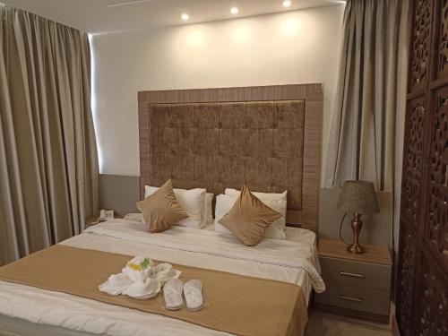 Alqimah Serviced Hotel Apartments Room Type - Deluxe King Suite