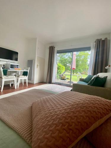 Cottage au sein du "Hameau du golf" de la Bretesche in มิสสิอา