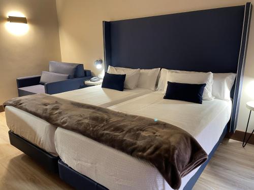 Habitación Twin Confort con cama supletoria