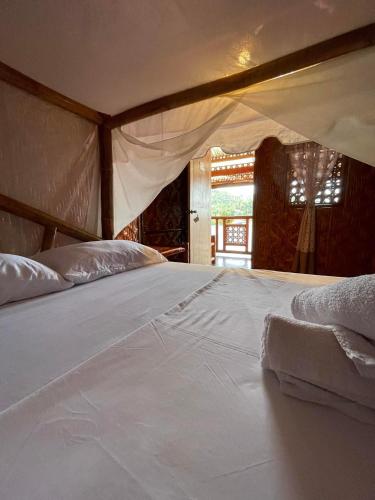 Bed, Camiguin Blue Lagoon Cottages in Mahinog