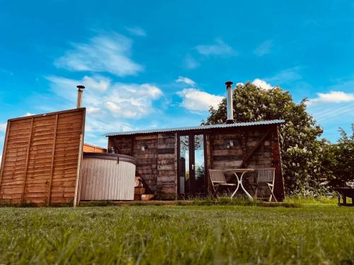 Cozy cabin w/ woodfired hot tub gîte à louer Weybread