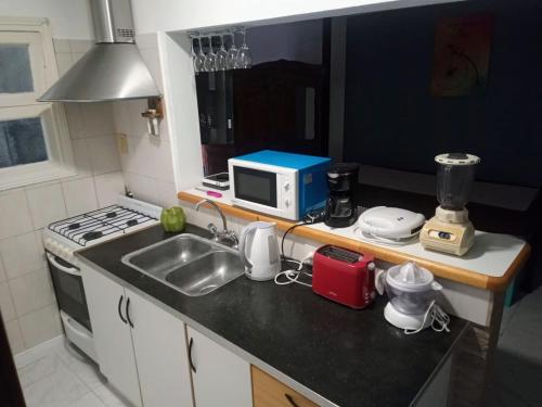 Kitchen, Departamento NALU-RUMU in Mar Del Plata City Center