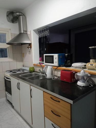 Kitchen, Departamento NALU-RUMU in Mar Del Plata City Center