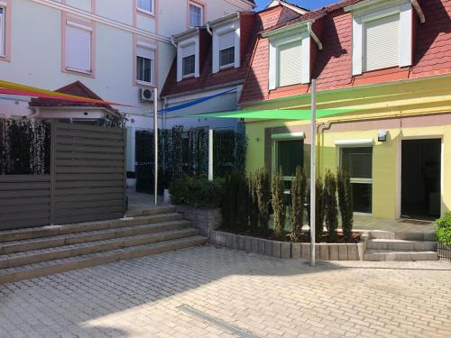 La Bella Centrum Apartmanok Kék Zöld