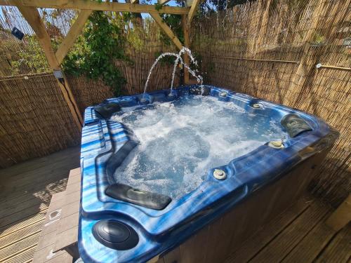 2 bedroom house with hot tub, near beaches etc