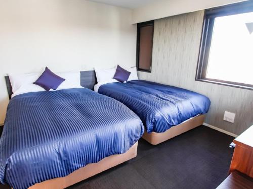 Twin Room - Smoking room in Hotel Livemax Kyoto Nijojo-Kita