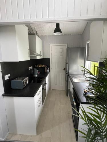 кухня, Cherry tree Lodge in Sandbank