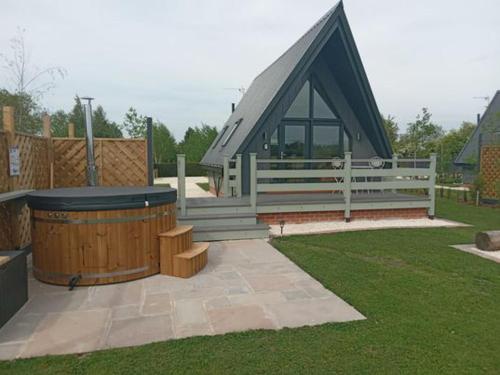 Delightful rural retreat with hot tub and views gîte à louer Burringham