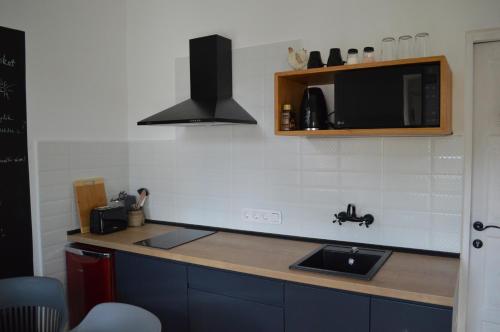 ห้องครัว, Kiskilenc Vendégház (Kiskilenc Vendeghaz) in ซาร์วาสโก
