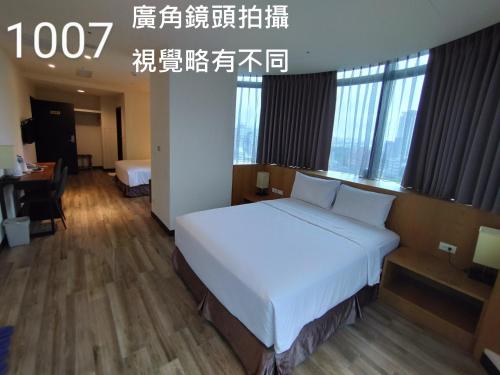 Honest&Warm Hotel near Taoyuan County Stadium