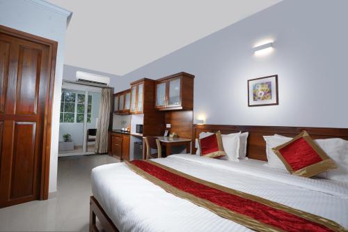 TGR SUITES – Cochin, NE